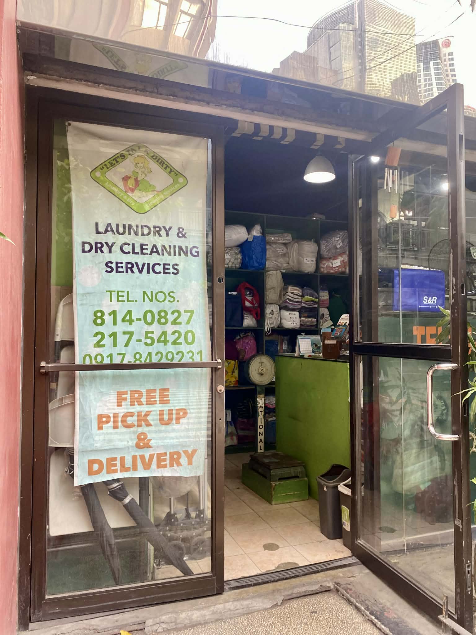 A laundry shop in Manila offering pickup and delivery services