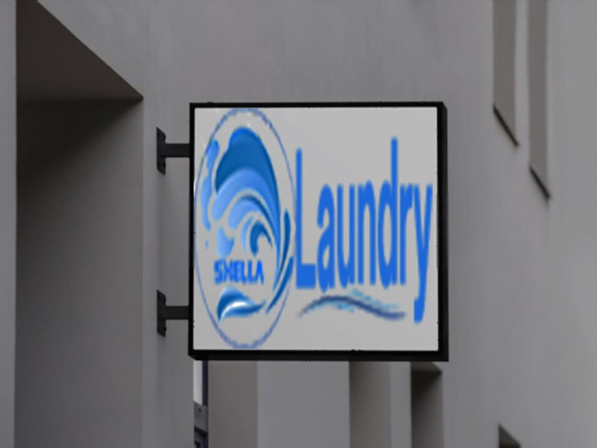 SHELLA Laundry & Dry Clean surabaya laundry shop in Surabaya